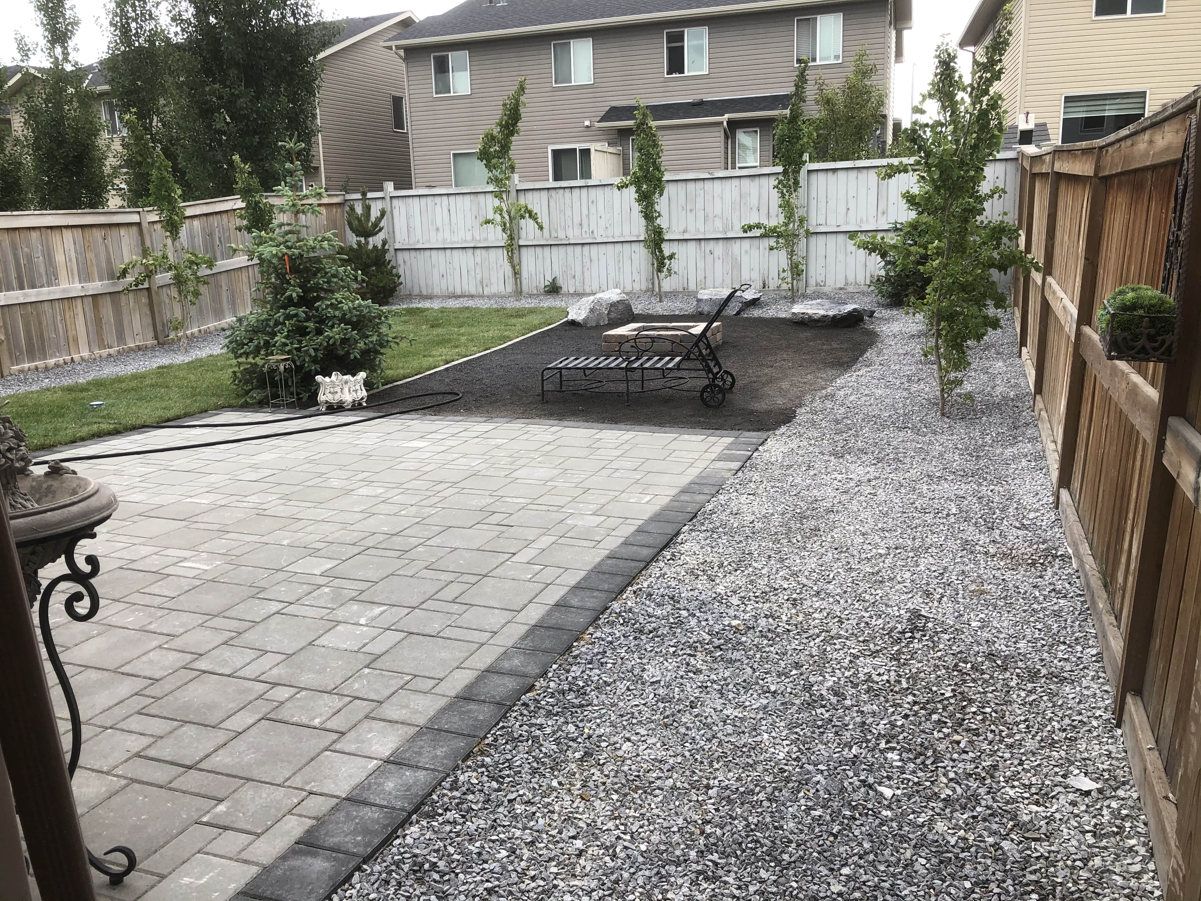 decorative-landscaping-rocks-and-paver-patio-installation